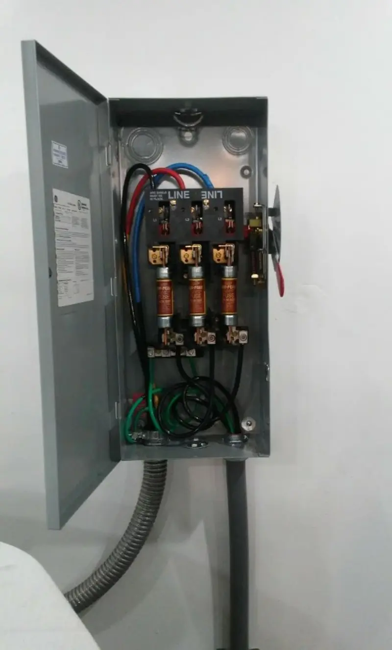 Three-phase disconnect switch installed for Smoke Detector Installation in Marlboro Meadows